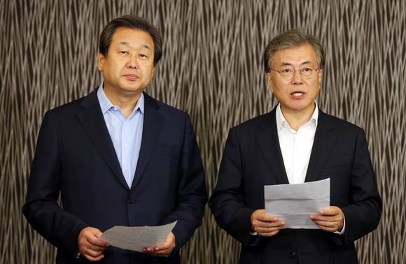회동 결과 발표하는 김무성.문재인/뉴시스