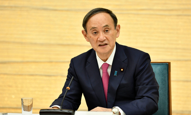 스가 요시히데 일본 총리가 지난 22일 총리 관저에서 코로나19 대책 본부 회의를 가지고 발언하고 있다.