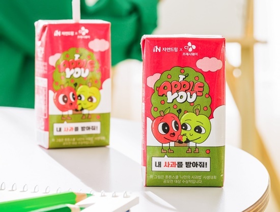 자연드림 한모금사과 콜라보 상품 연출 이미지. ⓒ 파이낸셜데일리 / CJ프레시웨이