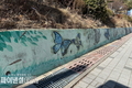 울진군, '울진초교 앞 옹벽, 밝은 벽화 거리'로 새 단장